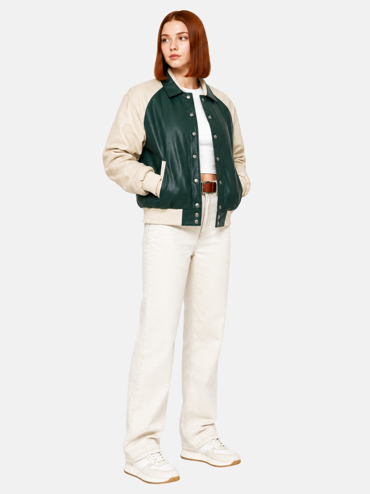 Green and cream women's leather varsity jacket, three-quarter front angle, full body, on model