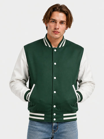 Man wearing a green satin varsity jacket with white sleeves and striped rib trims, front view