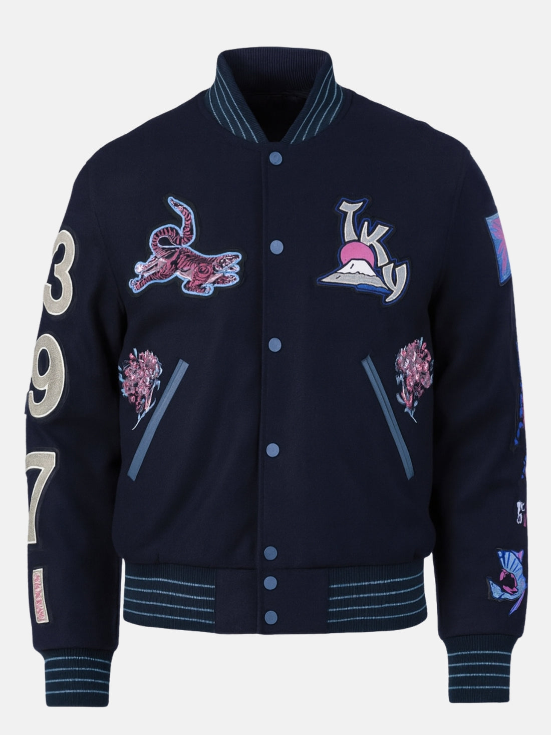 Man wearing a navy Japanese varsity jacket with tiger patch and TKY Fuji crest