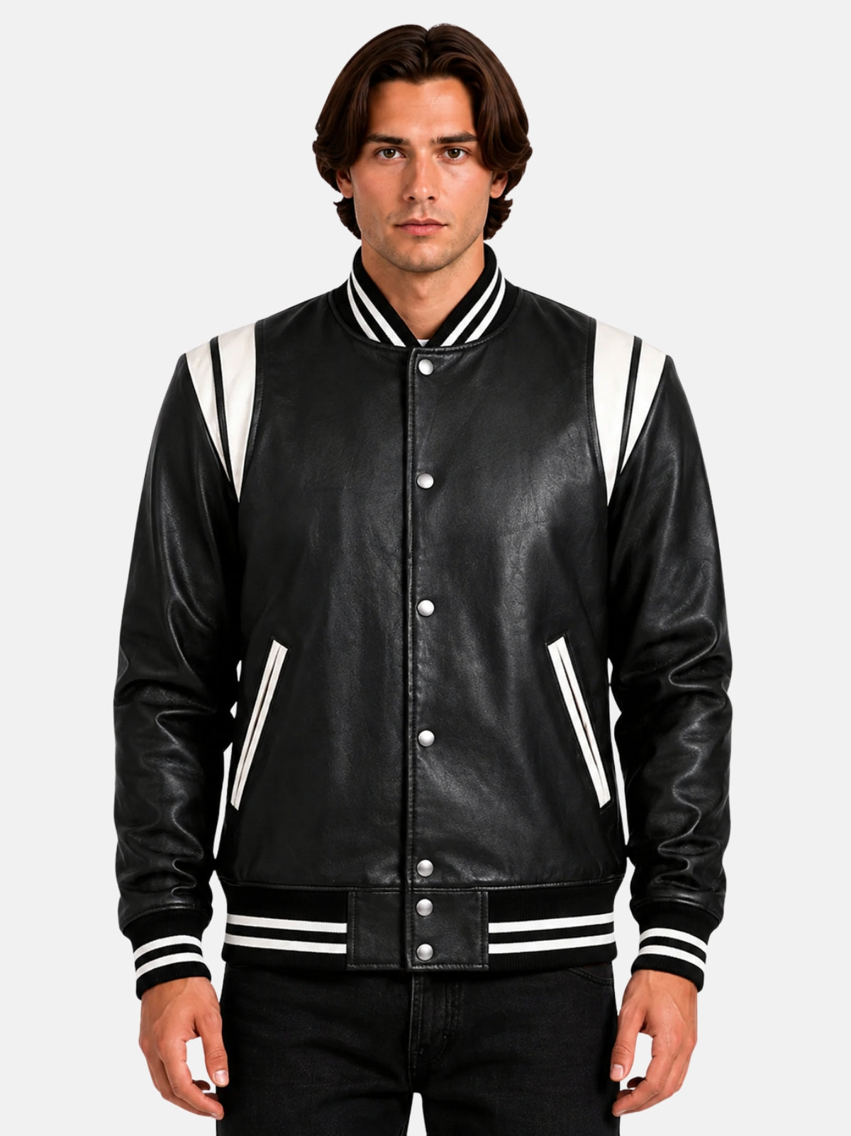 Man wearing black leather biker varsity jacket with white shoulder panels and silver snaps