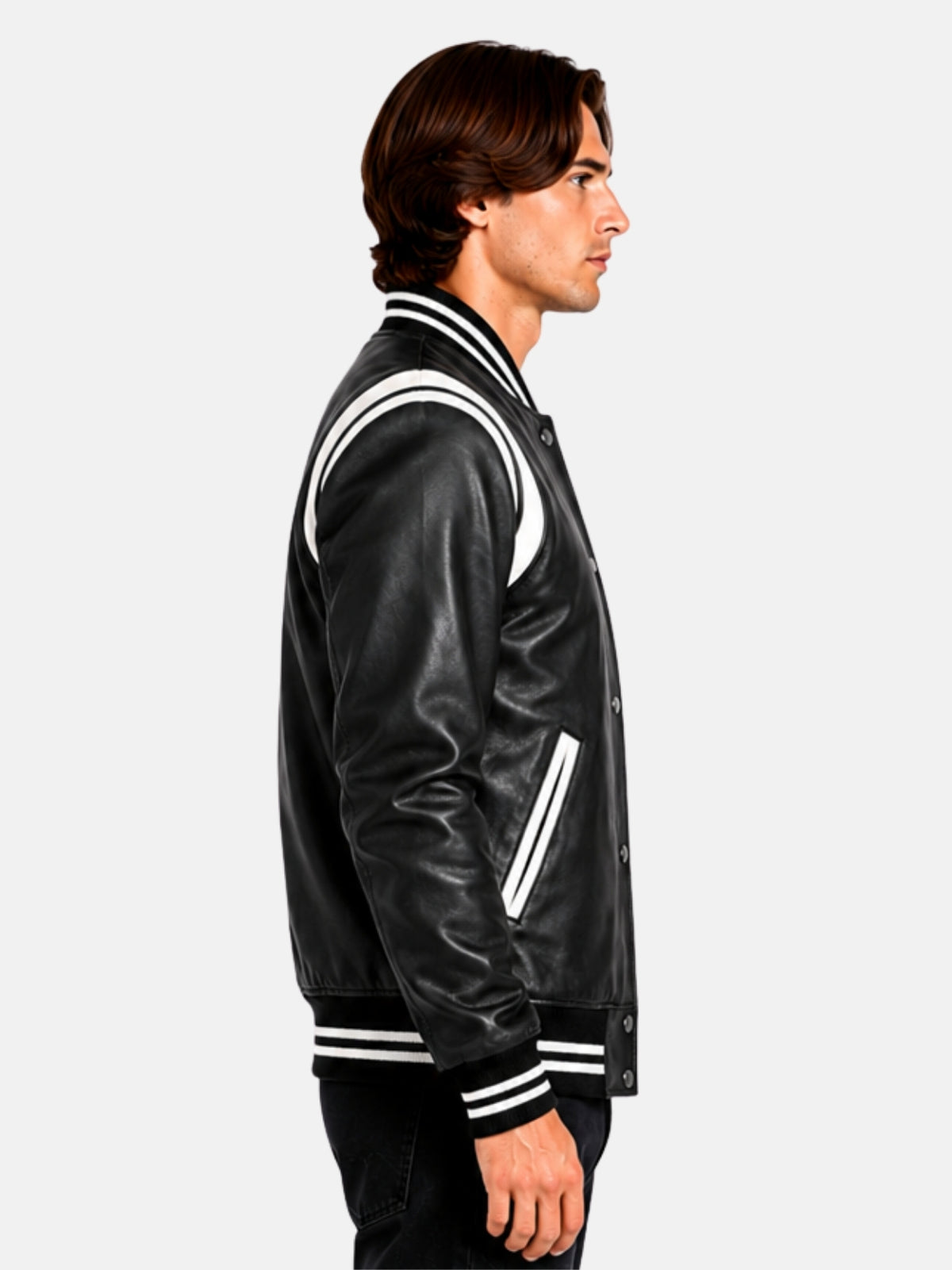 Side profile showing white contrast shoulder insert on black leather varsity jacket