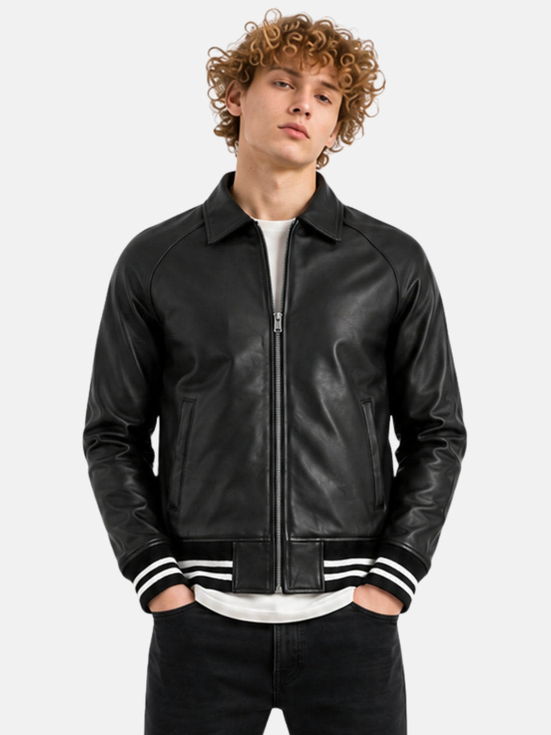 Man wearing black leather letterman jacket with striped rib hem and silver zip