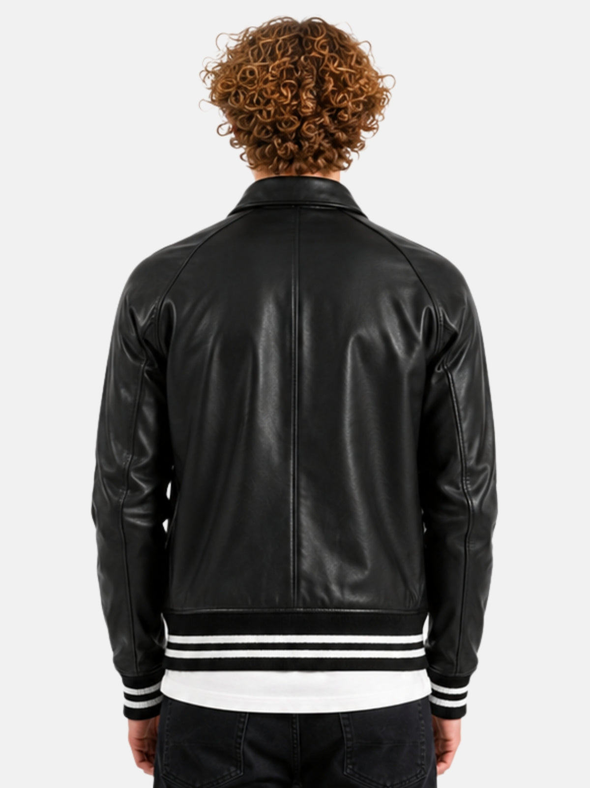Model showing clean black leather back of letterman jacket with striped hem