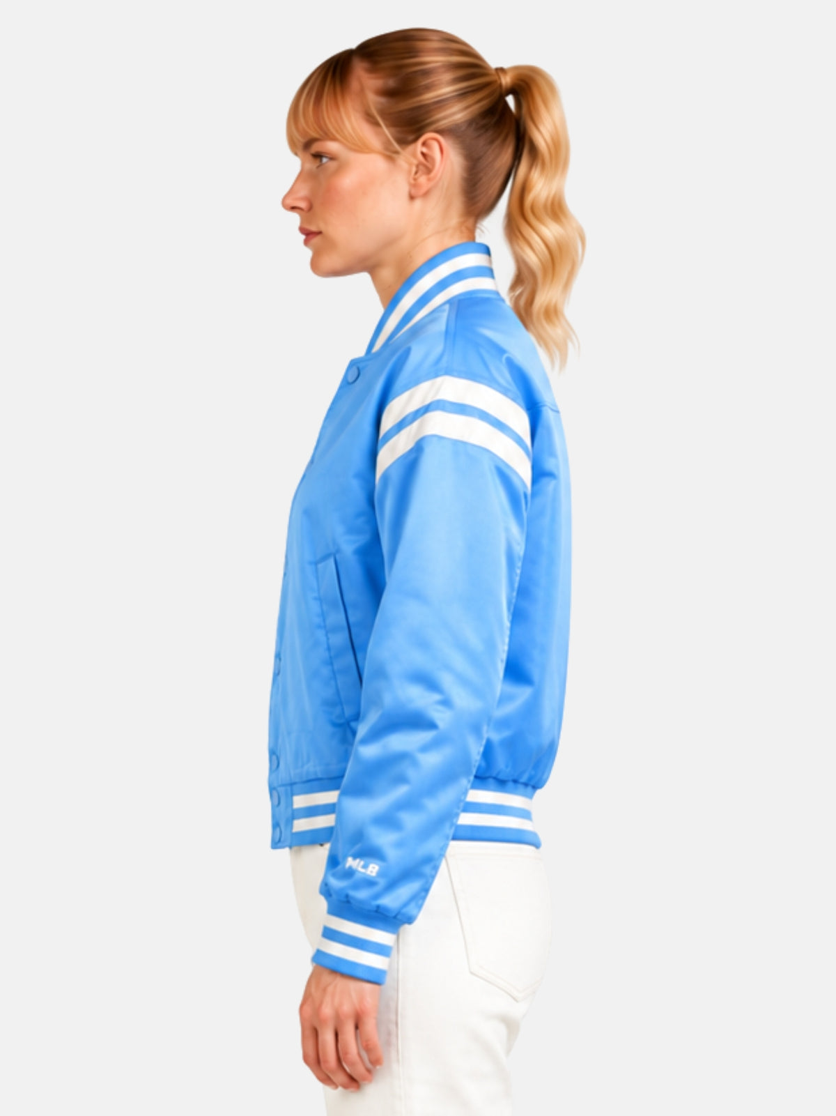 Side profile of light blue satin jacket showing diagonal sleeve stripe