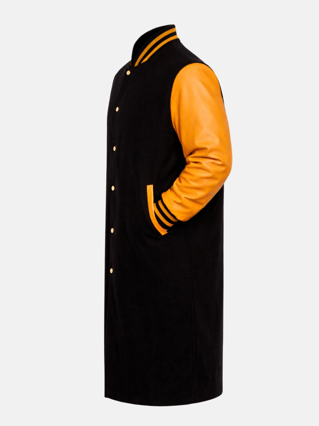 Profile of long black varsity coat with orange cowhide sleeve and gold snaps