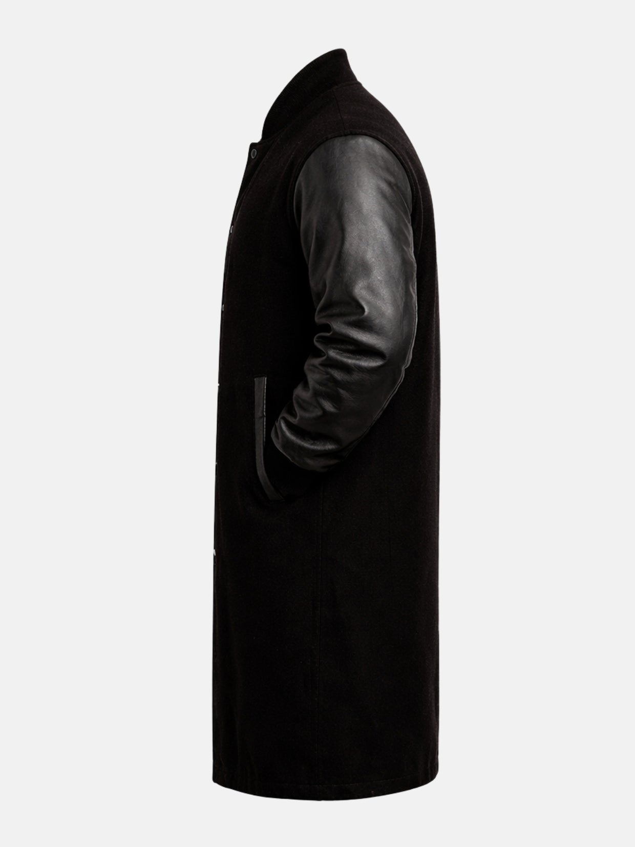 Profile of long black varsity coat with wool body and cowhide leather sleeve