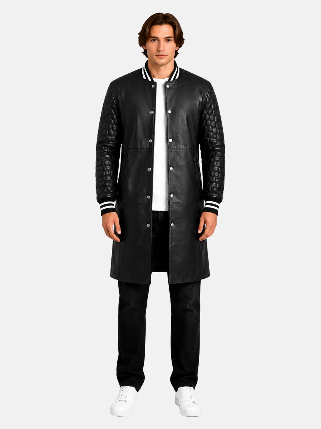 Man wearing longline black leather varsity coat with quilted sleeves and striped rib collar