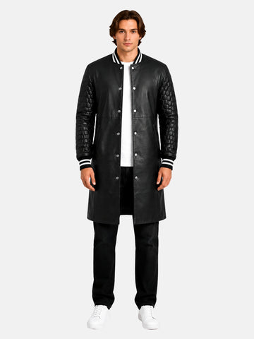 Man wearing longline black leather varsity coat with quilted sleeves and striped rib collar