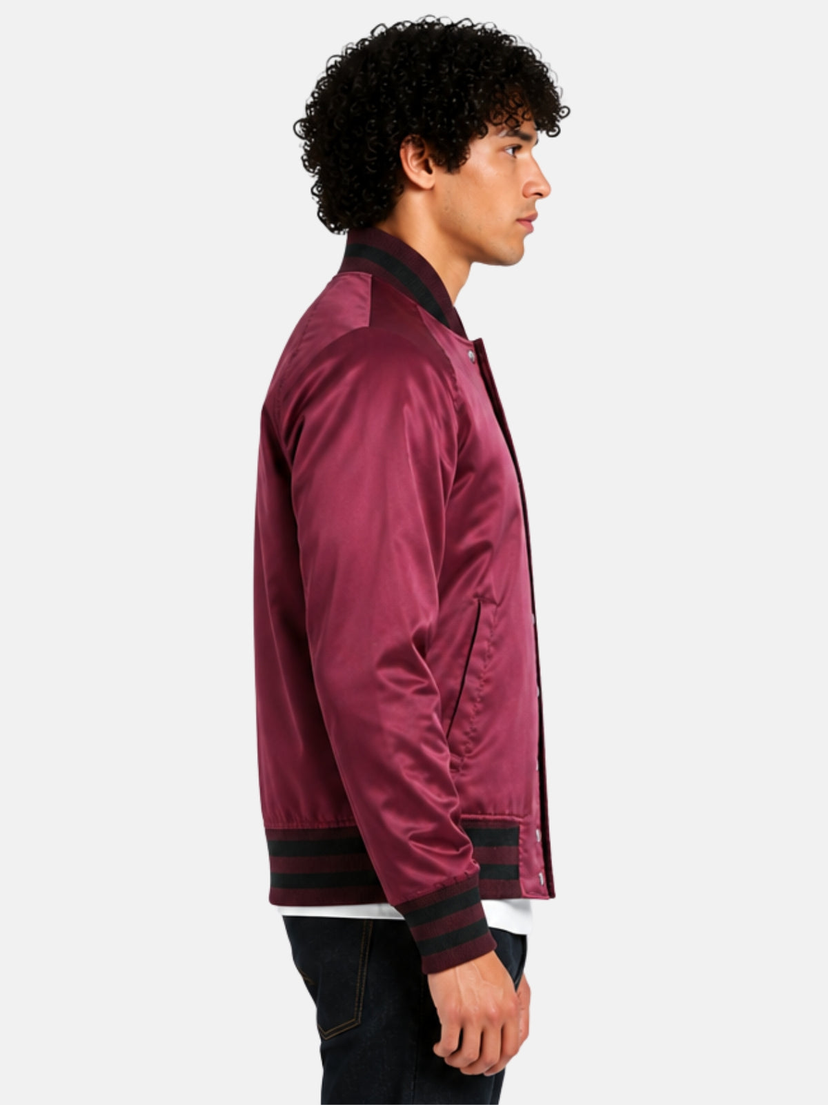 Side profile of maroon varsity jacket showing black striped cuff and raglan sleeve