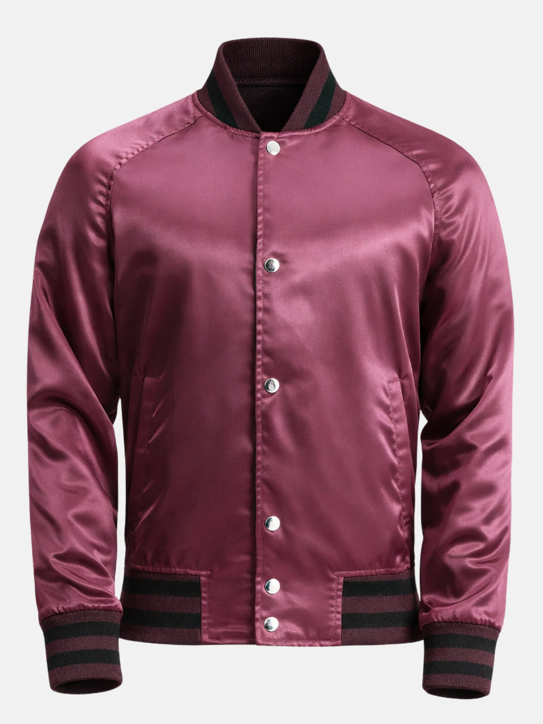 Man wearing a maroon satin varsity jacket with black ribbed trims and silver snaps