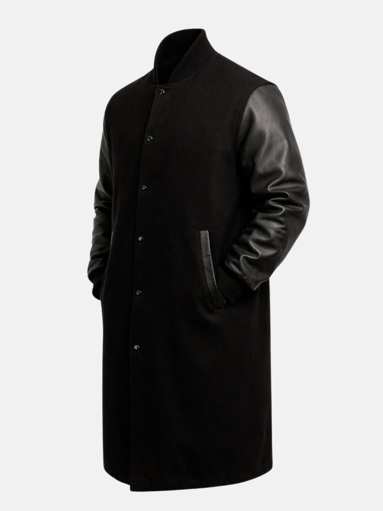 Angled view of men's black wool varsity coat with leather sleeves and knee-length cut