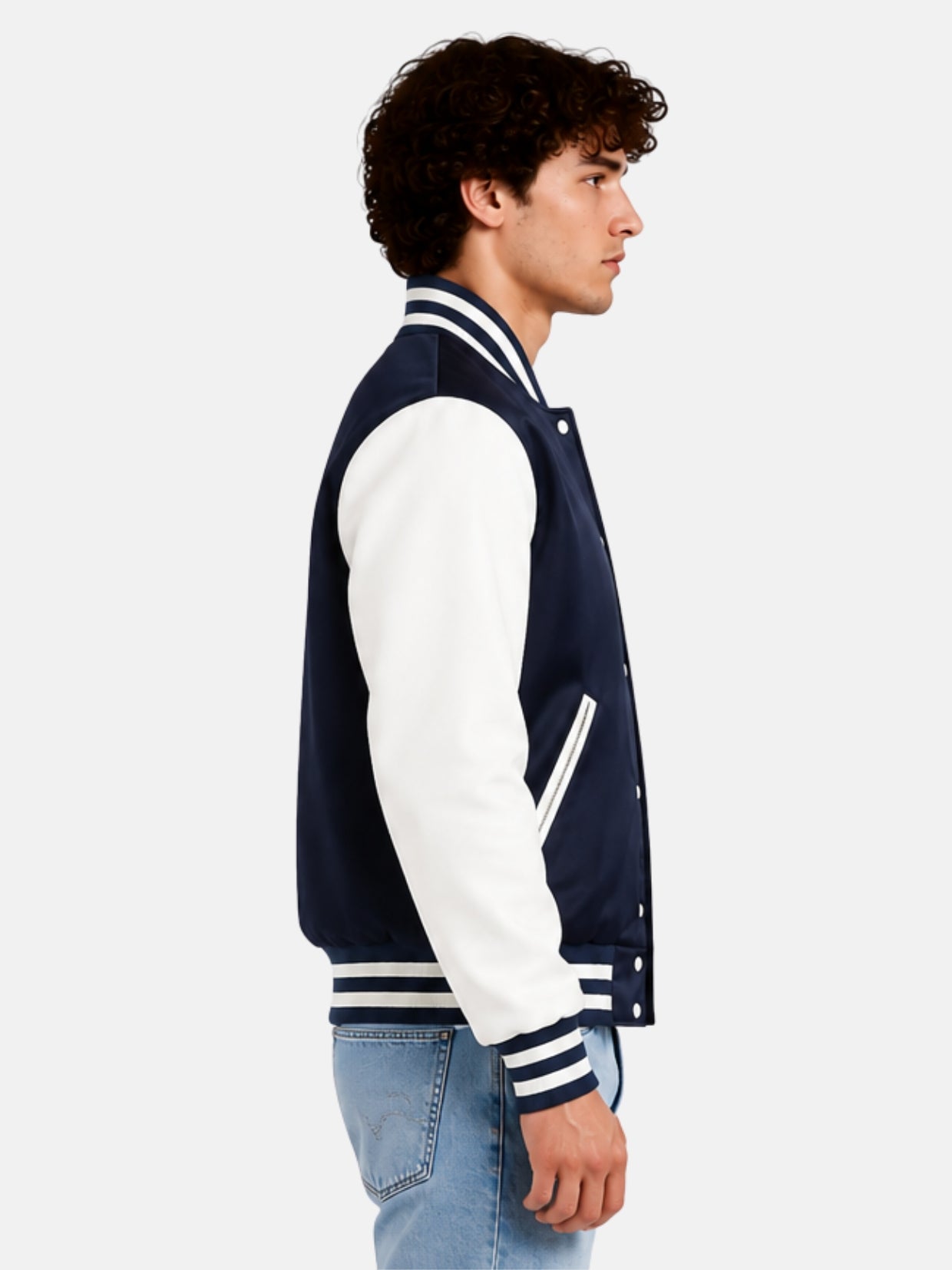 Side profile of mens navy varsity jacket showing white sleeve and striped cuff