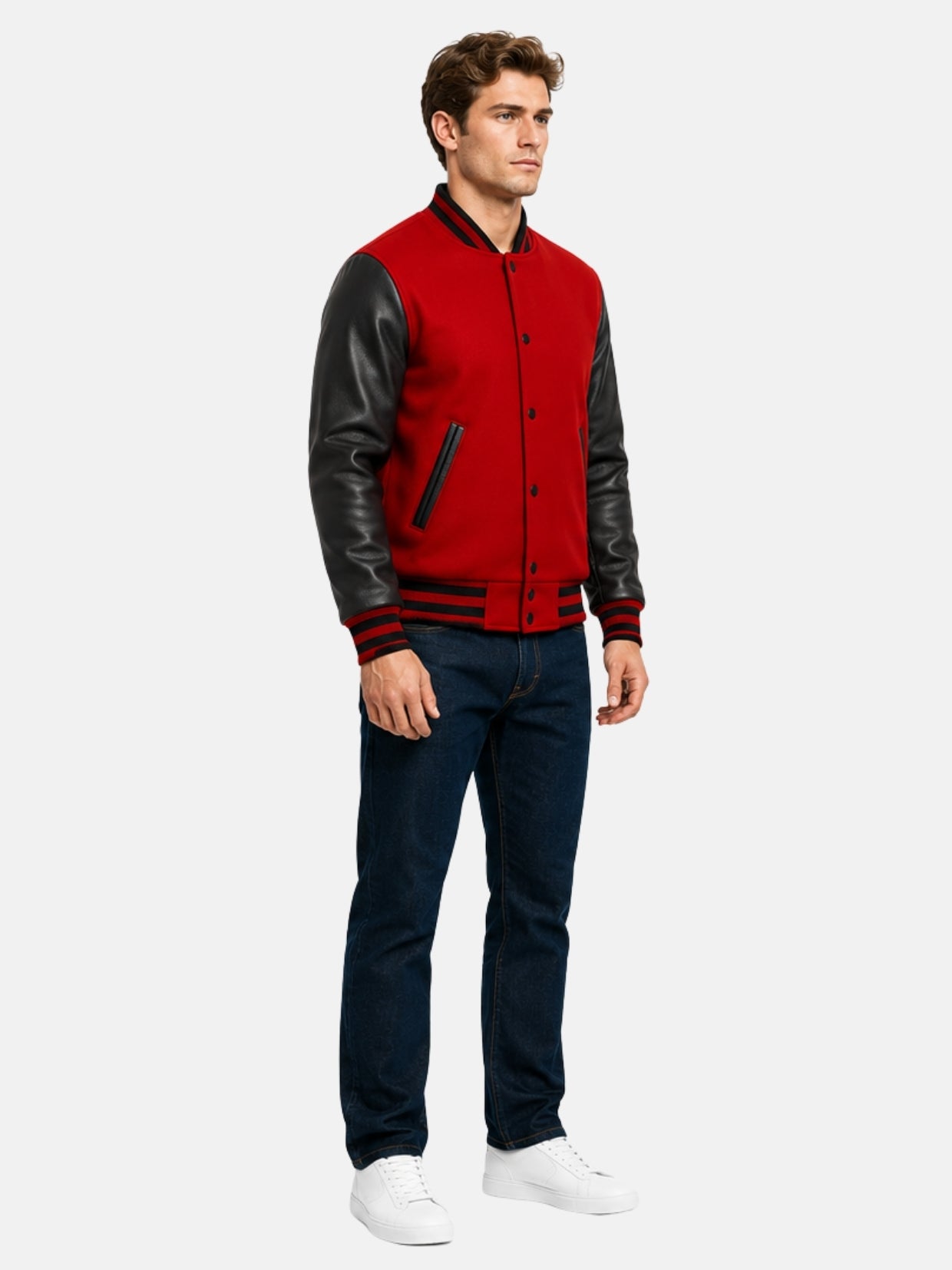 Full-length look with red and black letterman jacket, dark denim and white sneakers