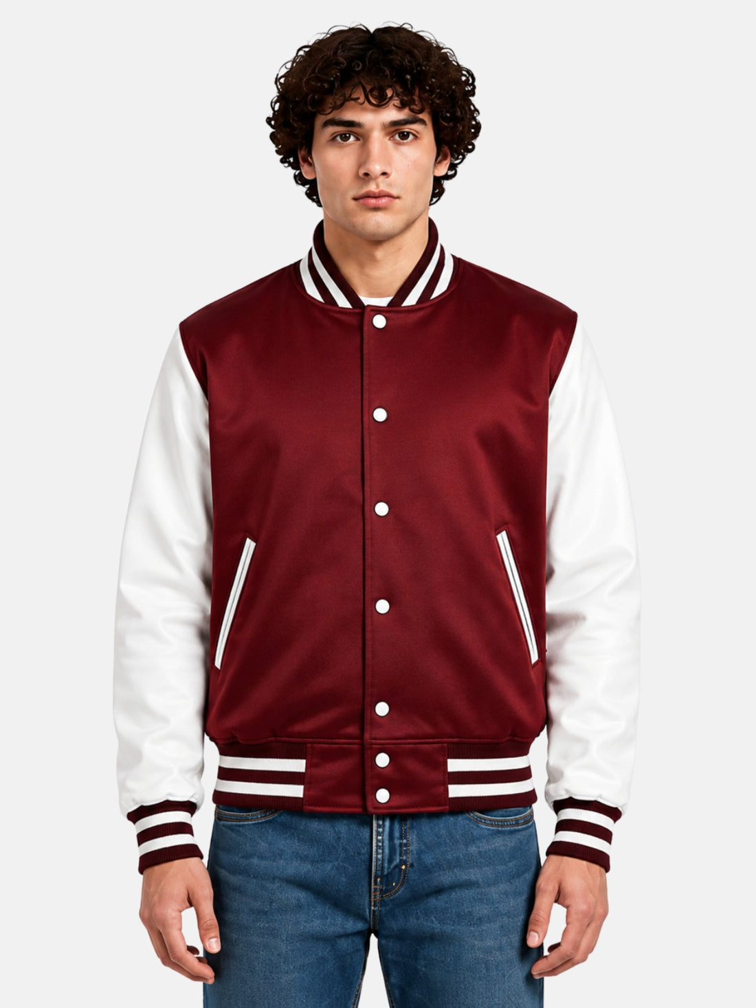 Man wearing a burgundy satin varsity jacket with white sleeves and snap front