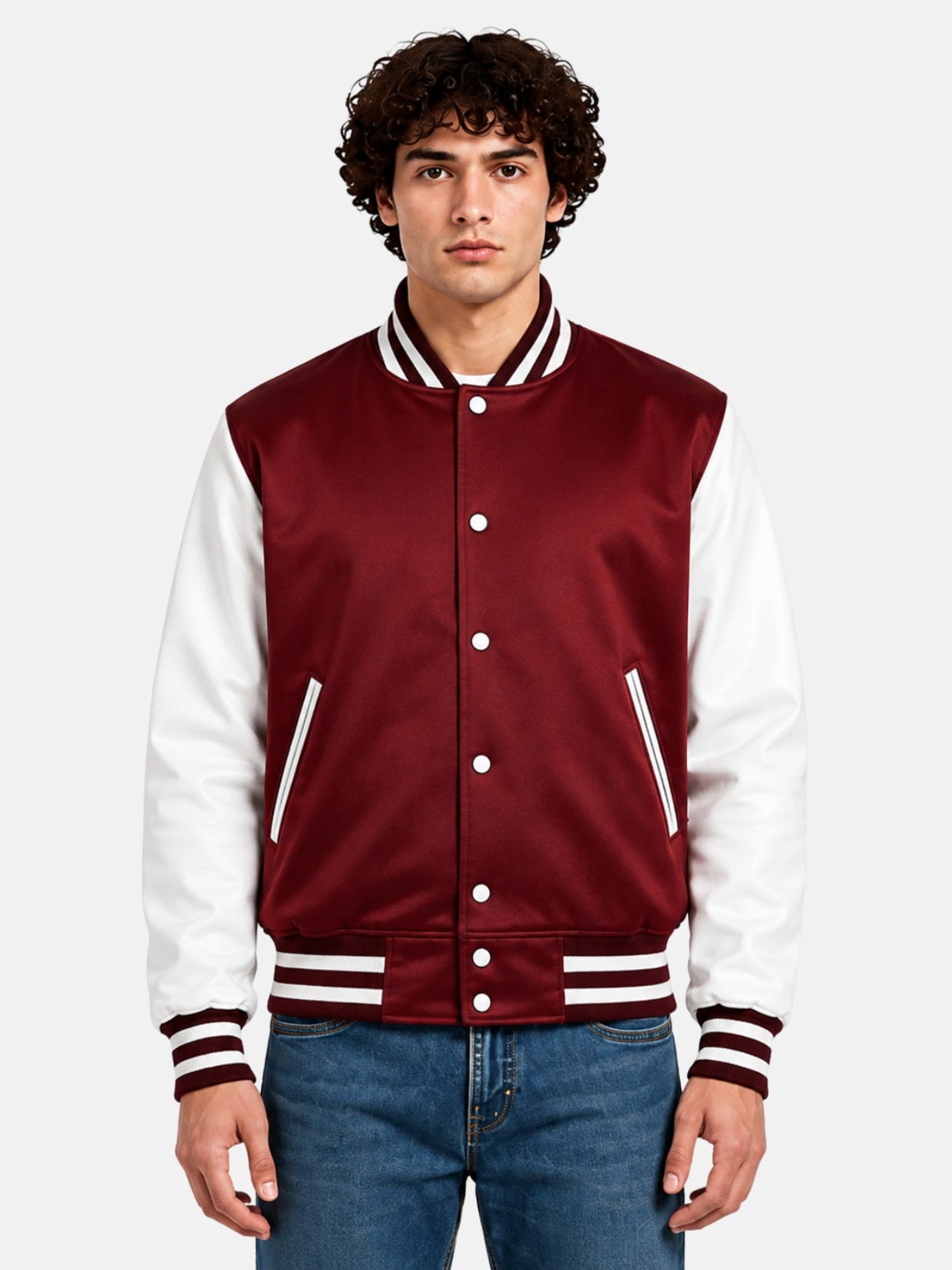 Man wearing a burgundy satin varsity jacket with white sleeves and snap front