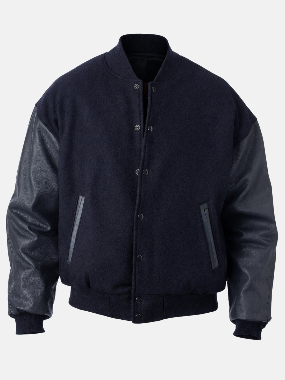 Man wearing a navy blue varsity jacket with leather sleeves and tonal snap front