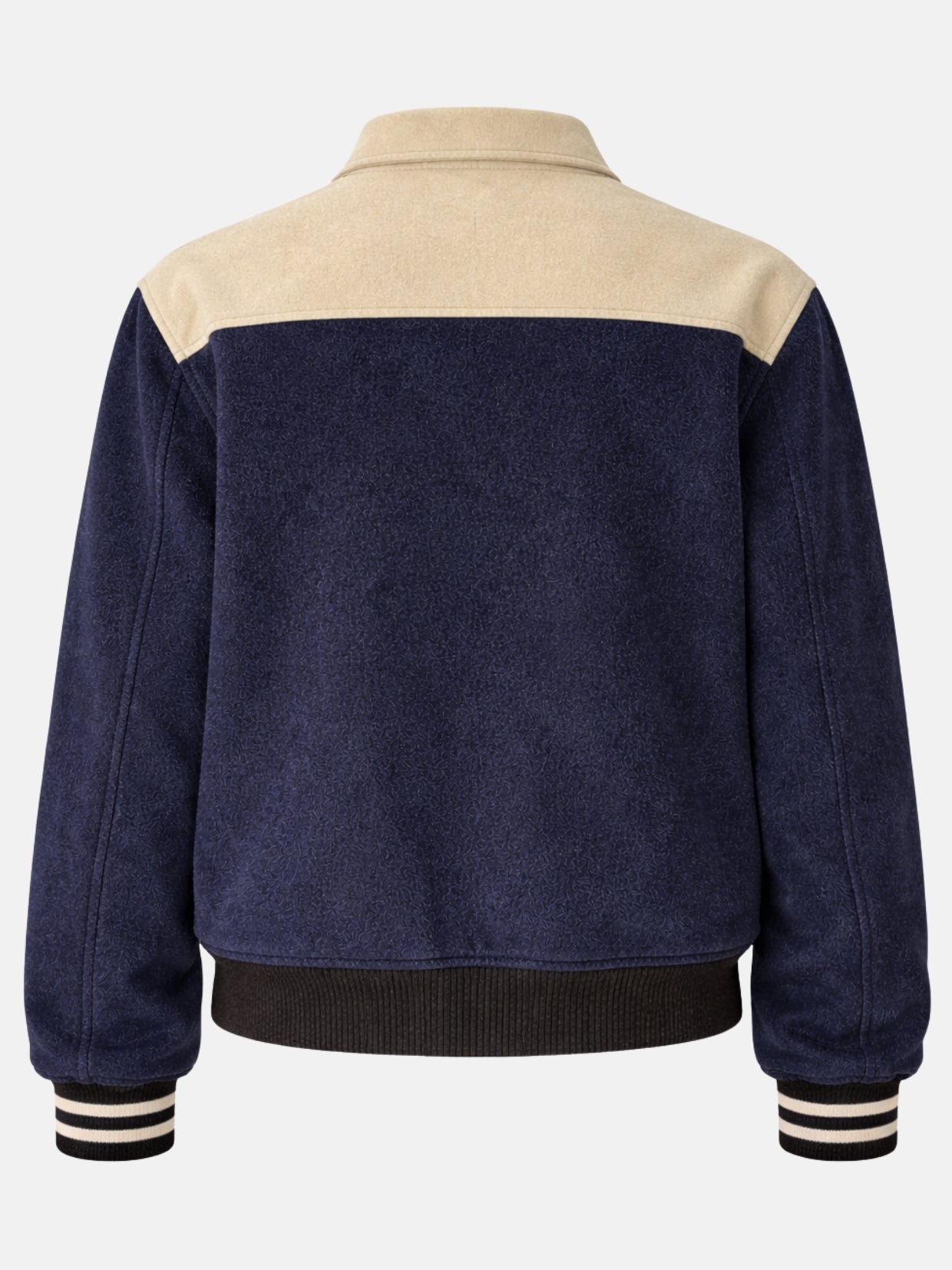 Flat lay back of navy wool jacket showing cream chevron yoke seam