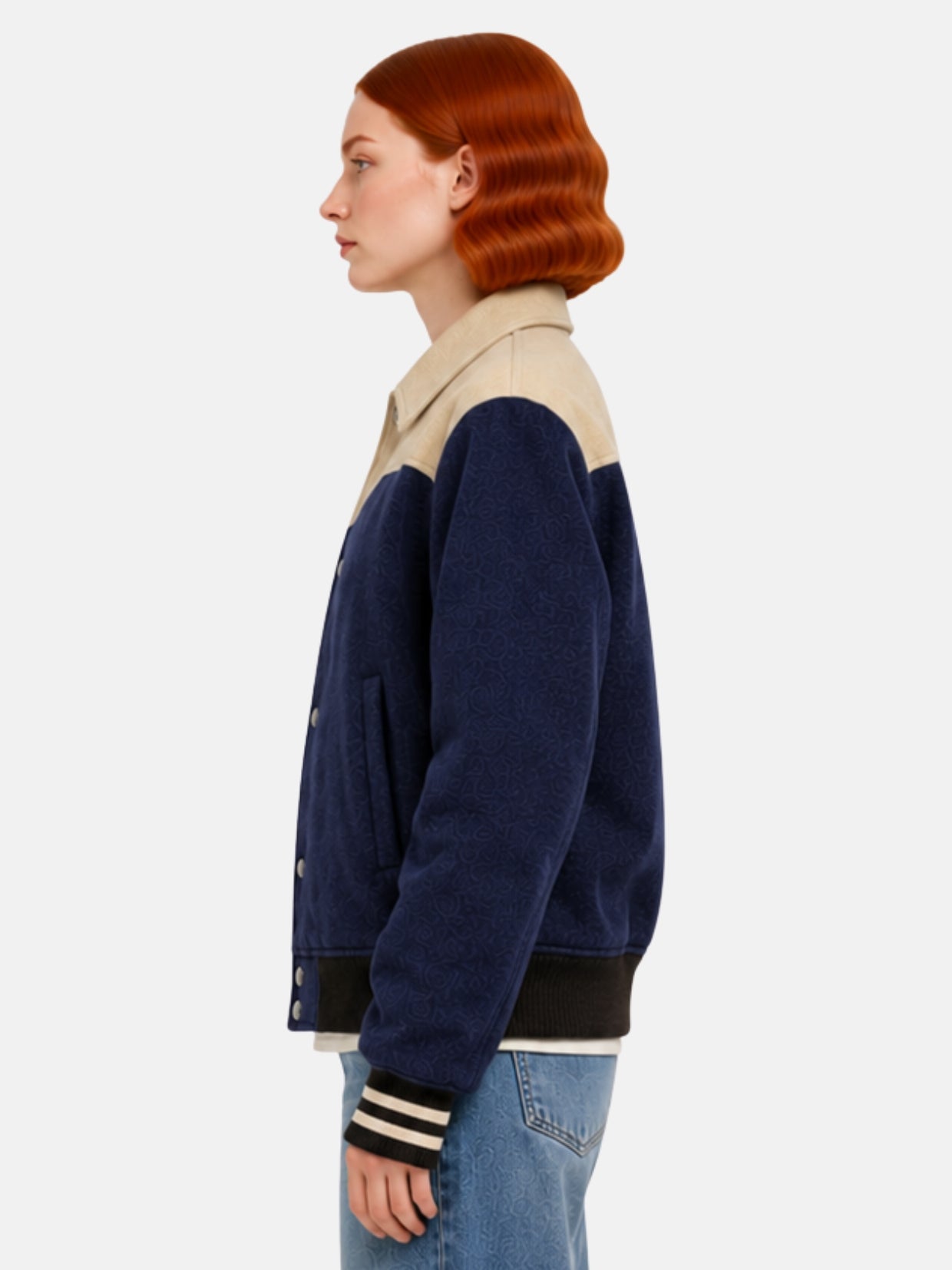 Side profile of navy western yoke jacket showing cream cuff stripe