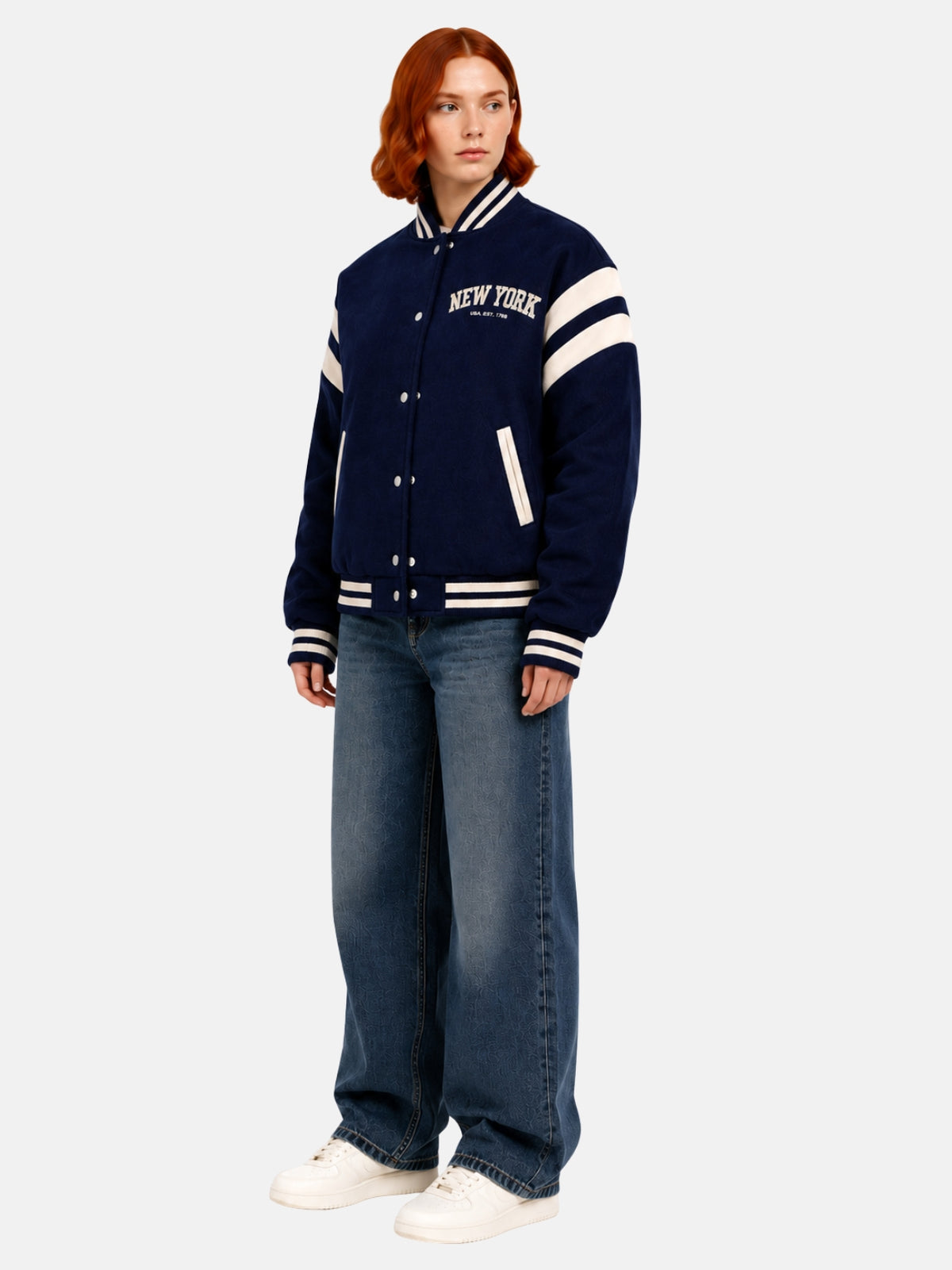 Angled full-body view of oversized navy New York varsity jacket