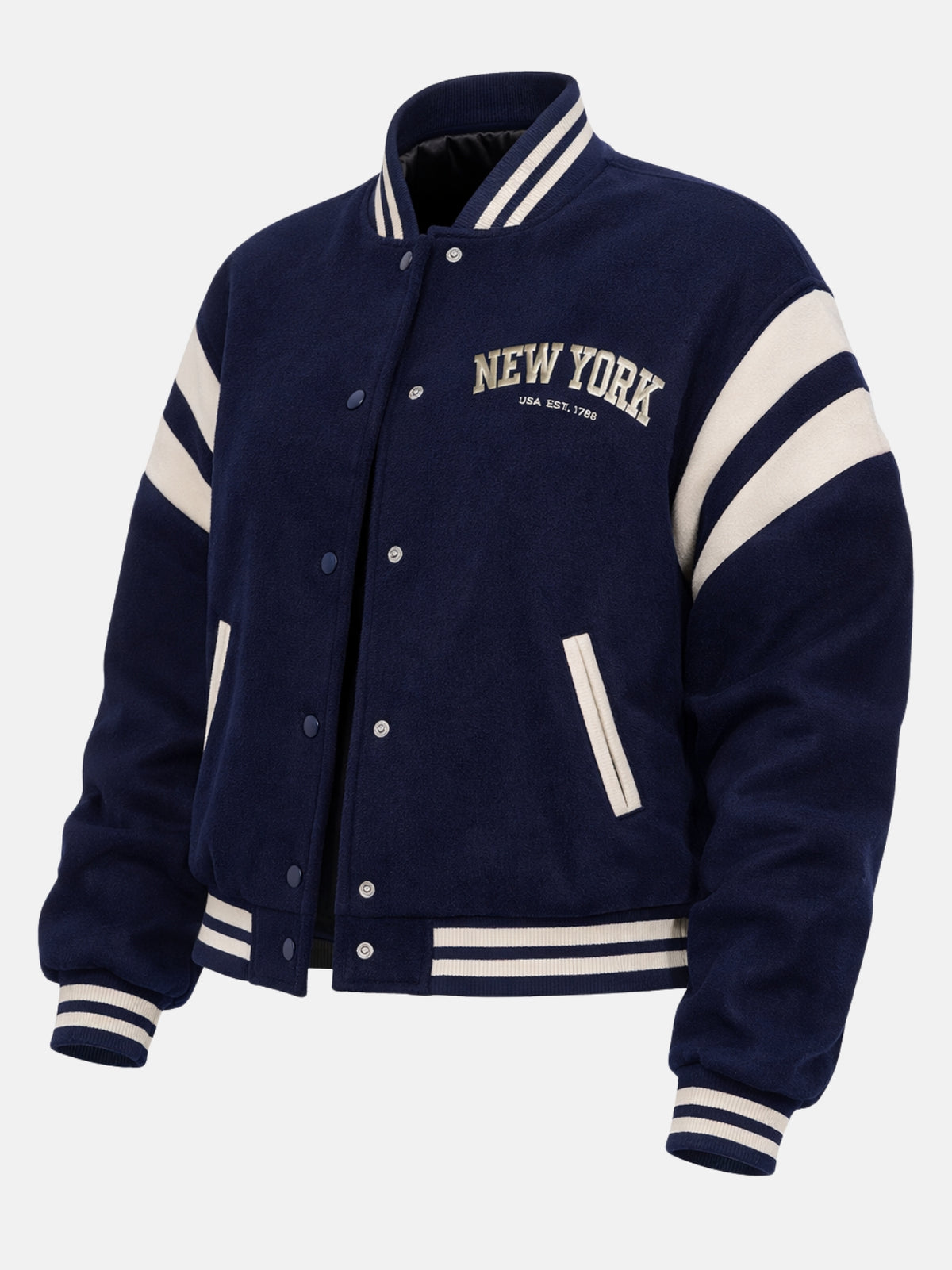 Flat lay front of navy wool jacket highlighting cream ribbed trim and snaps