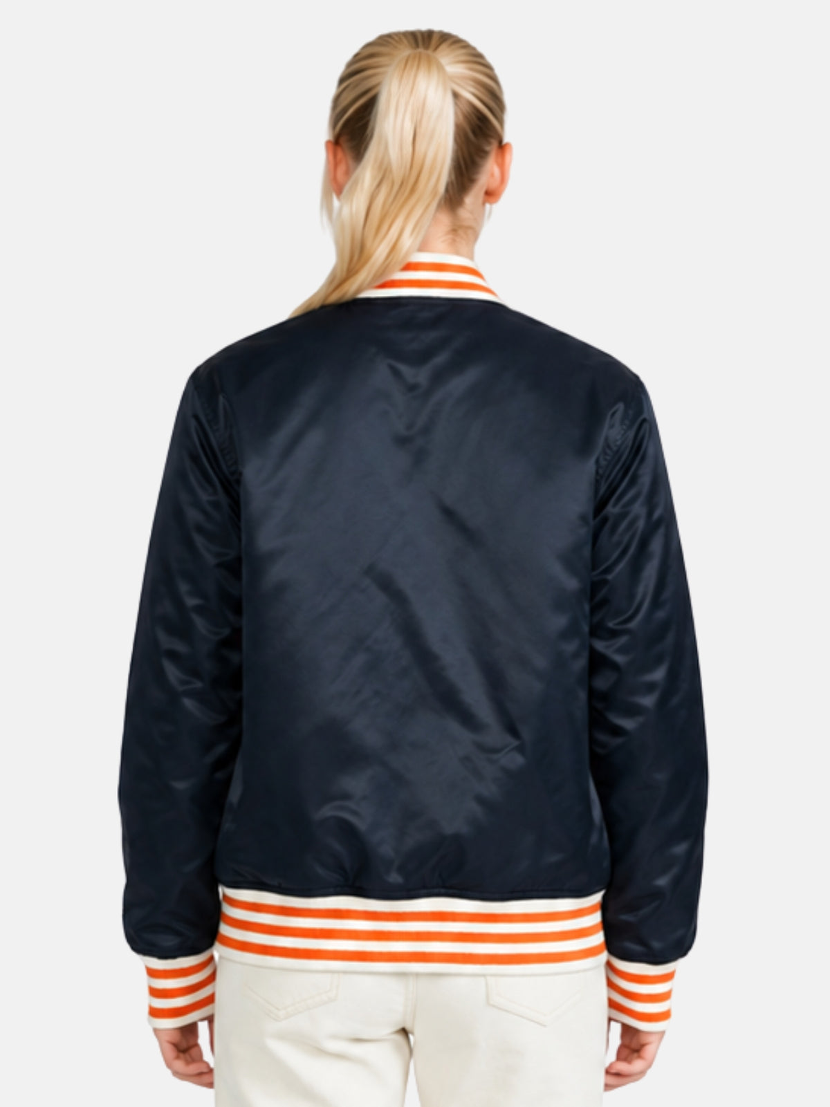 Back view of navy satin varsity jacket with orange ribbed trim