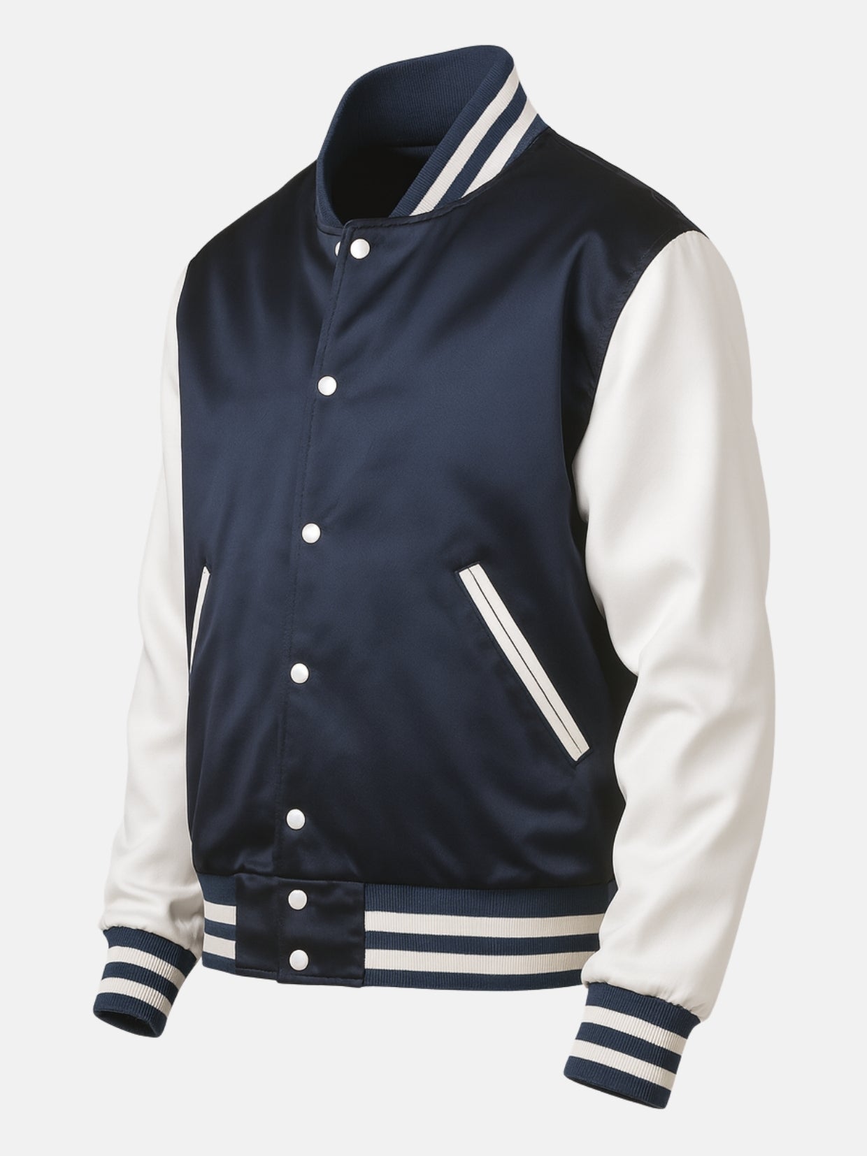 Angled front view of navy satin varsity jacket with white stripe ribbing and hem tab snaps
