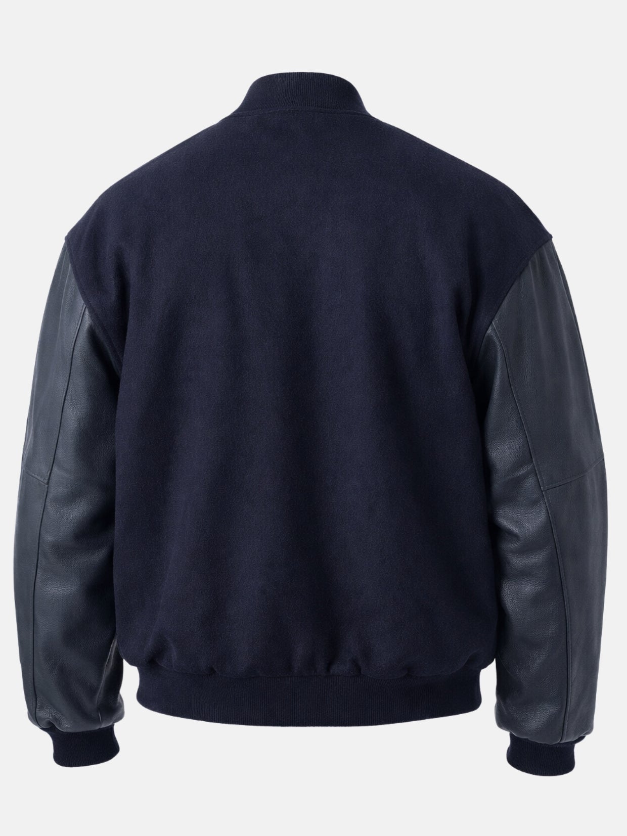 Clean patch-free back of a navy varsity jacket with leather sleeves, flat shot