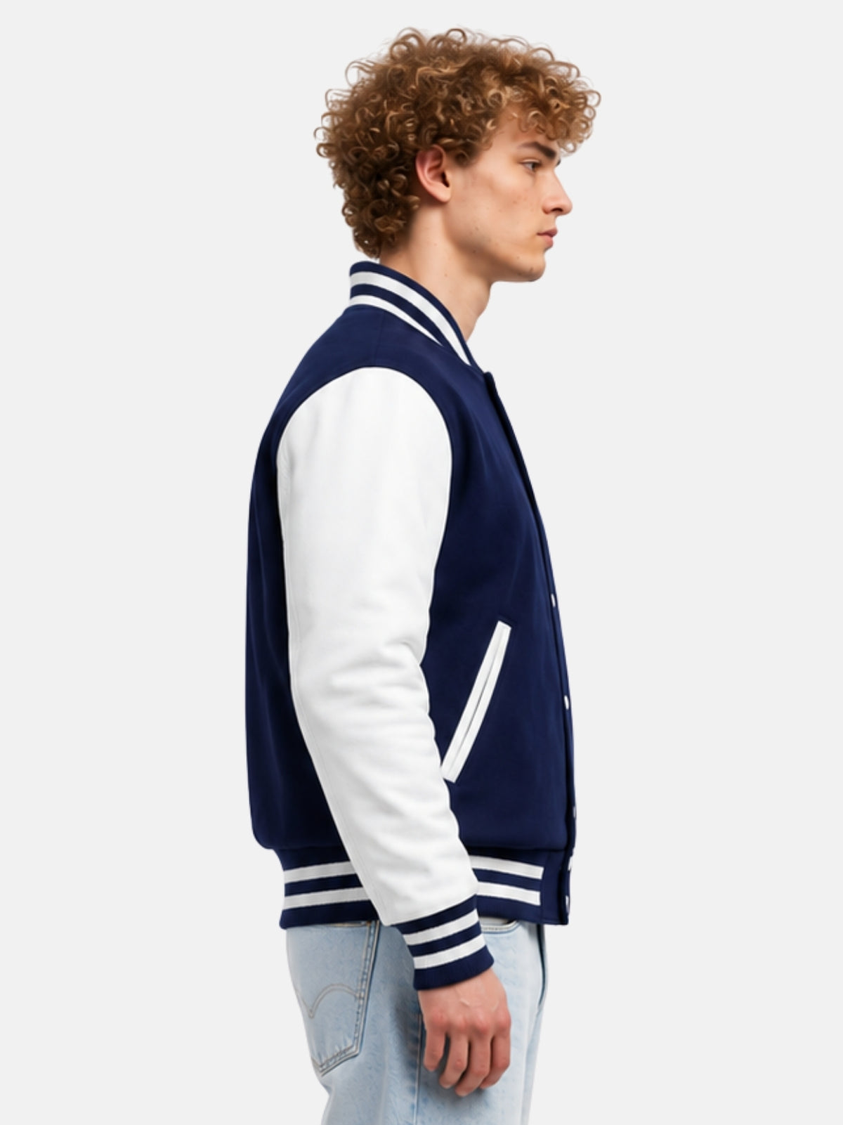 Side profile of navy wool baseball-collar jacket with white leather sleeve on model