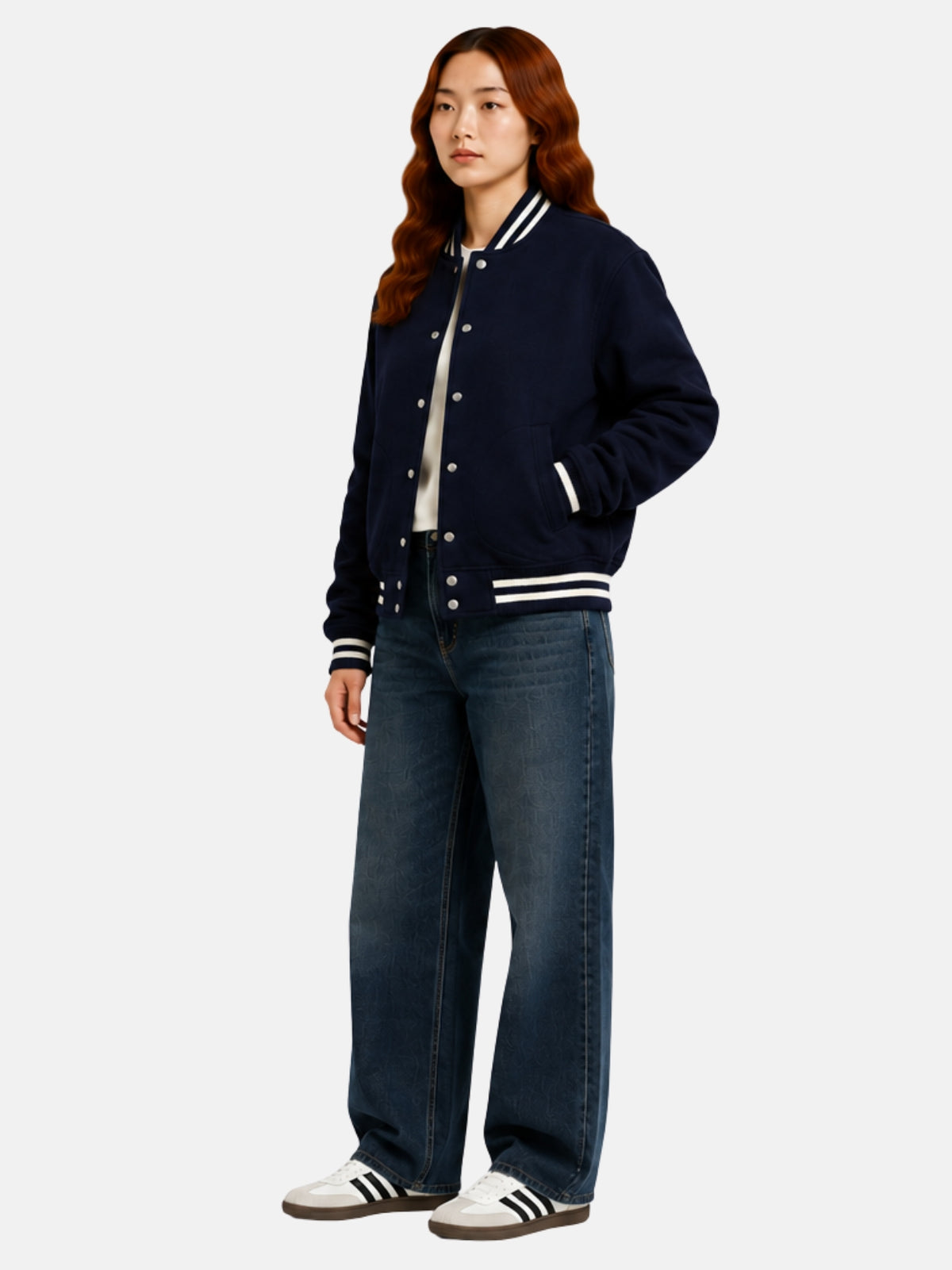 Full-length view of navy wool jacket with cream ribbed trim over denim