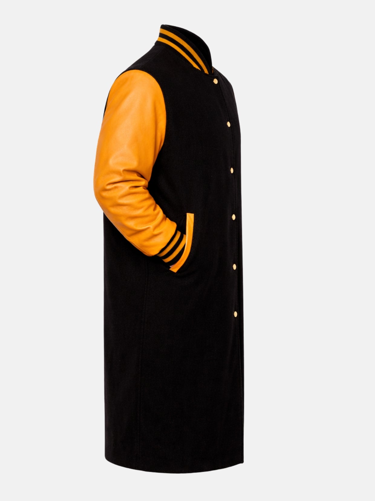 Orange leather sleeve and welt pocket of black wool varsity coat, side view