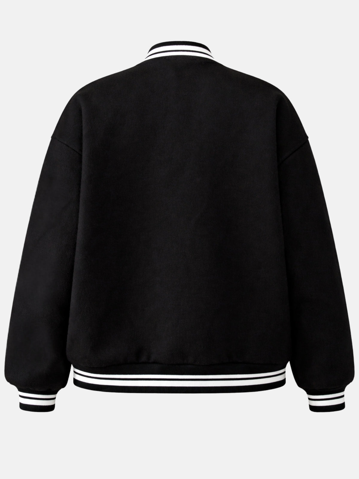 Flat lay back of oversized black varsity jacket with white ribbed collar and cuffs