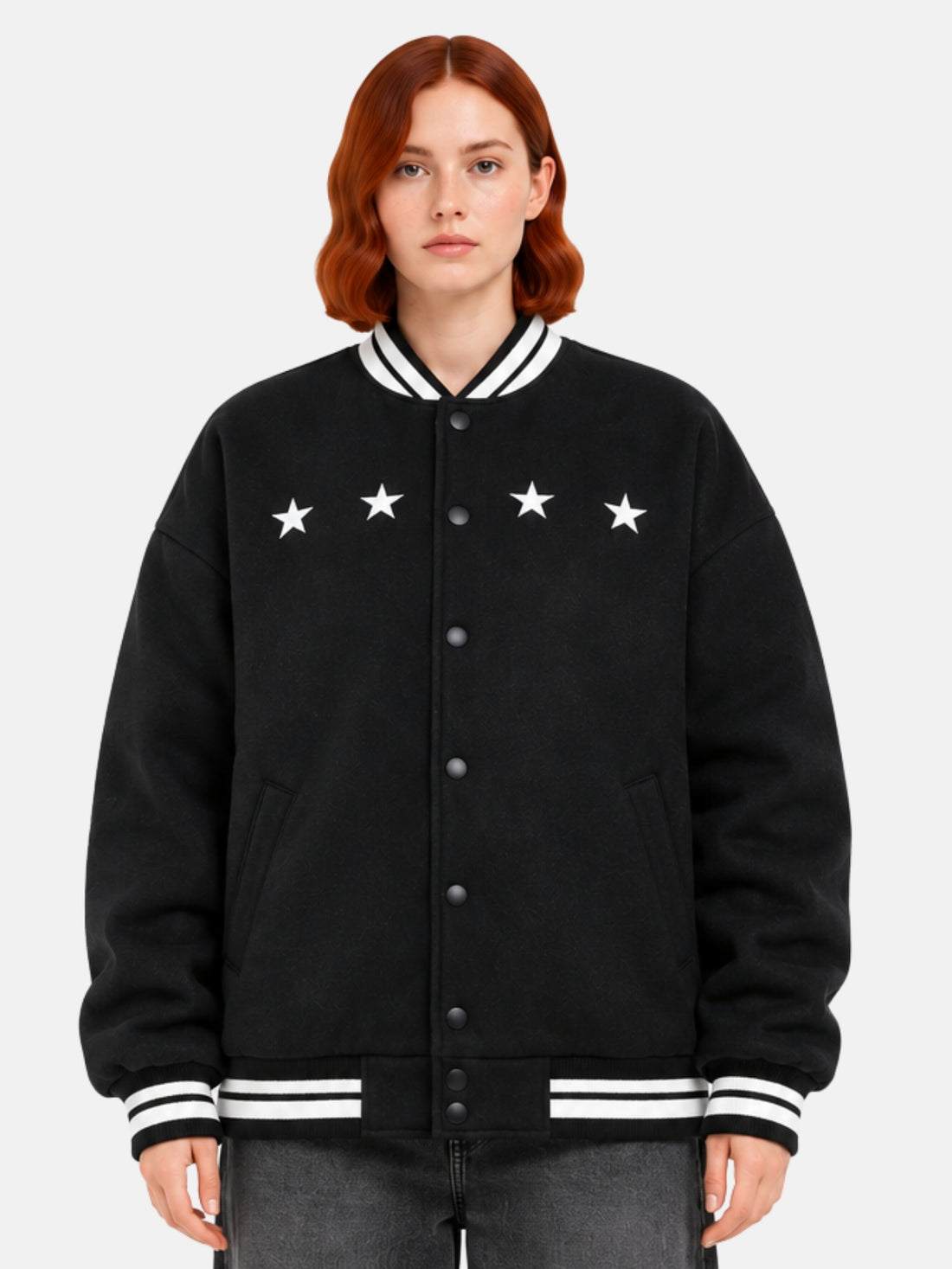 Oversized black wool varsity jacket with white star embroidery across the chestc