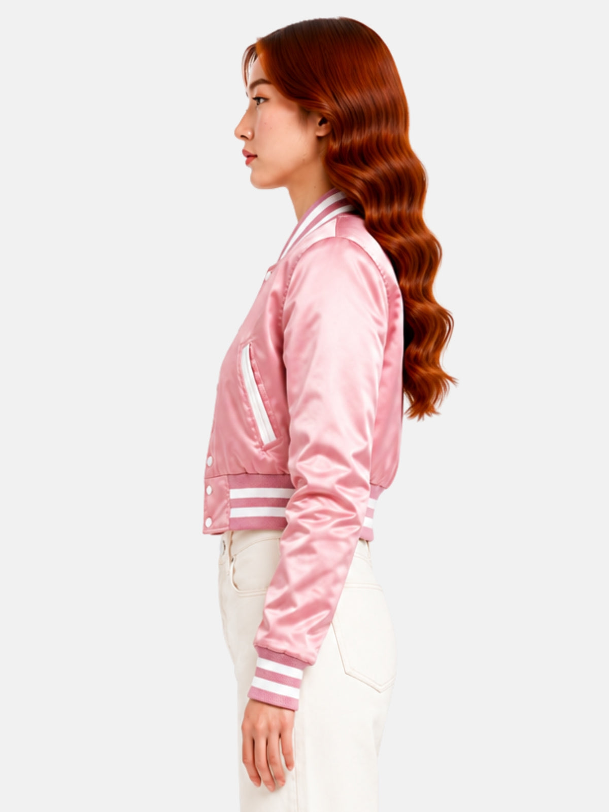 Side profile of model showing the white-piped pocket against the pink satin body