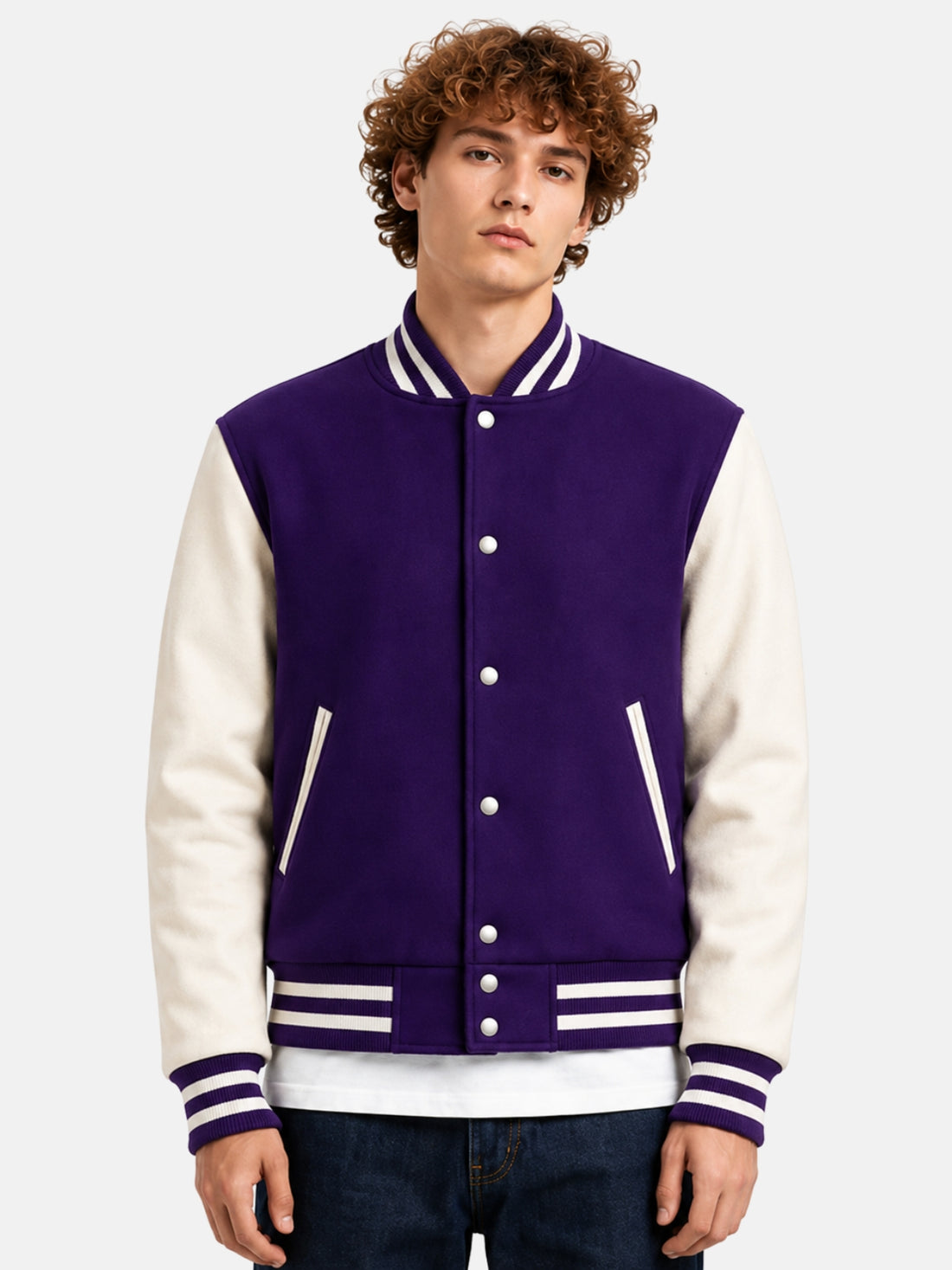 Man wearing a purple and white varsity jacket with striped rib trims and snap front