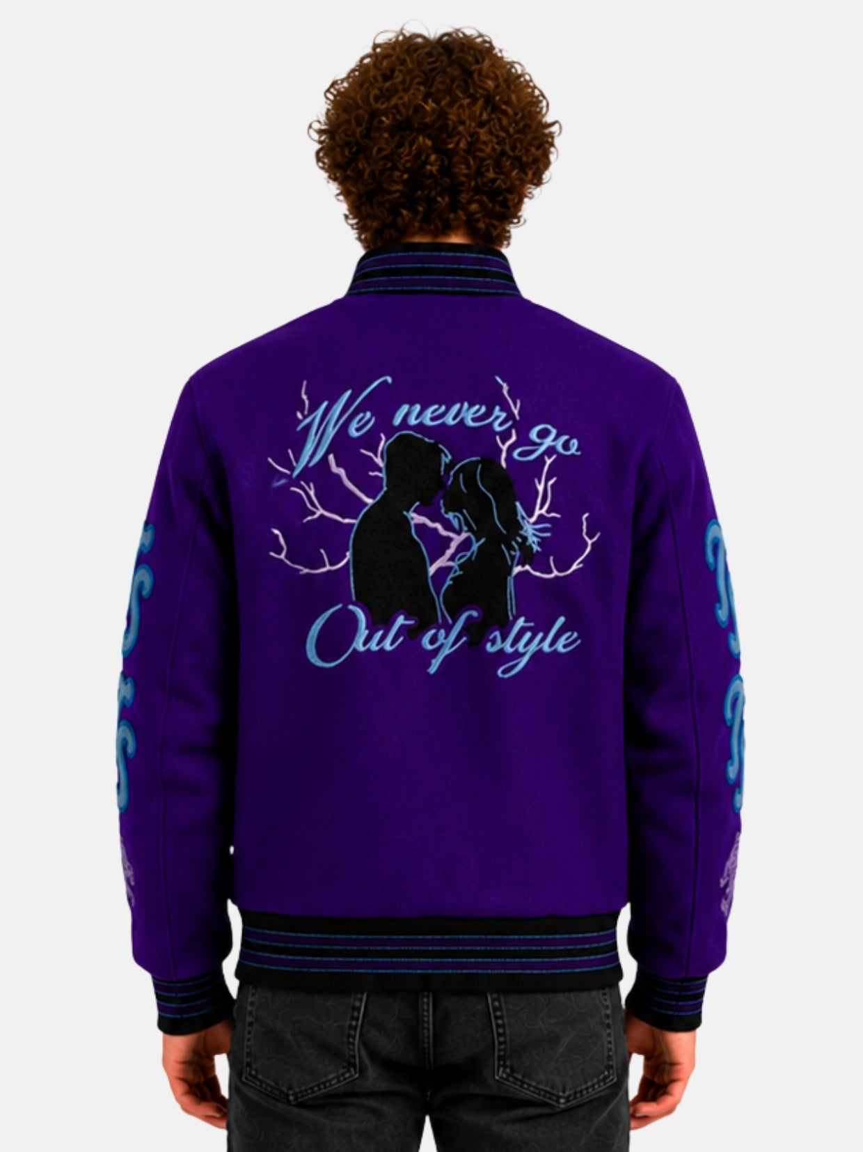 Back view of purple varsity jacket with embroidered lovers silhouette artwork