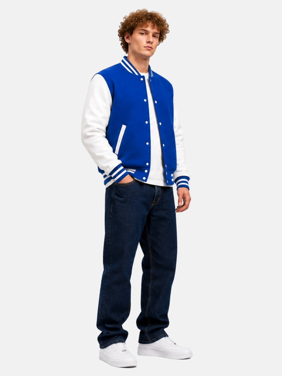 Full-length outfit with royal blue letterman jacket, dark jeans and white sneakers