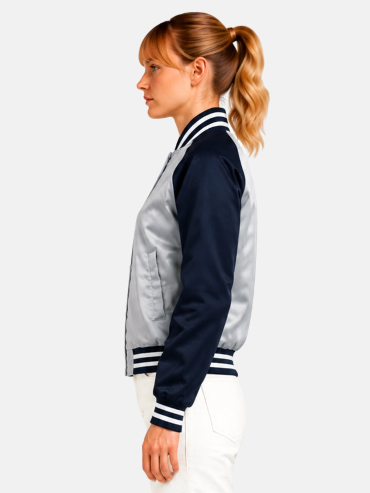 Side profile of silver satin jacket showing navy raglan sleeve