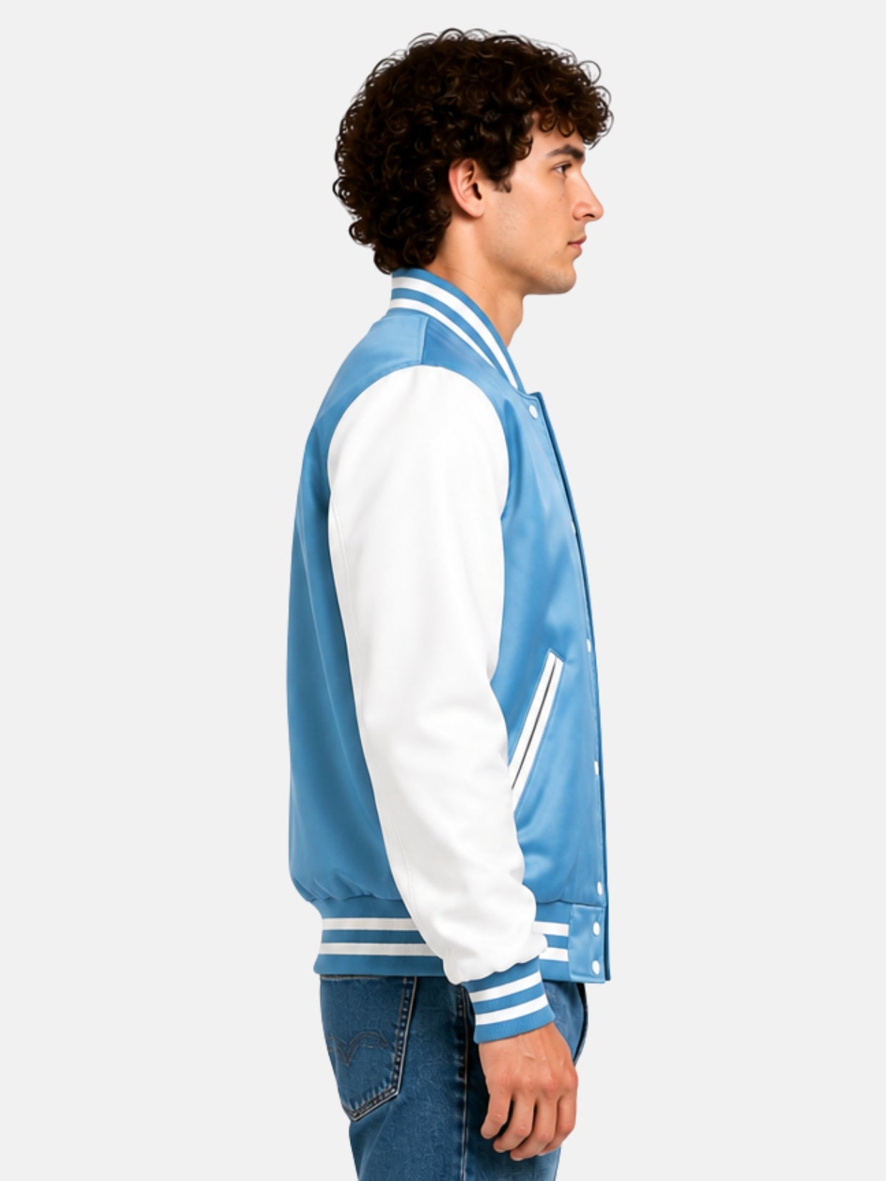Side profile of a sky blue satin letterman jacket with white sleeves on model
