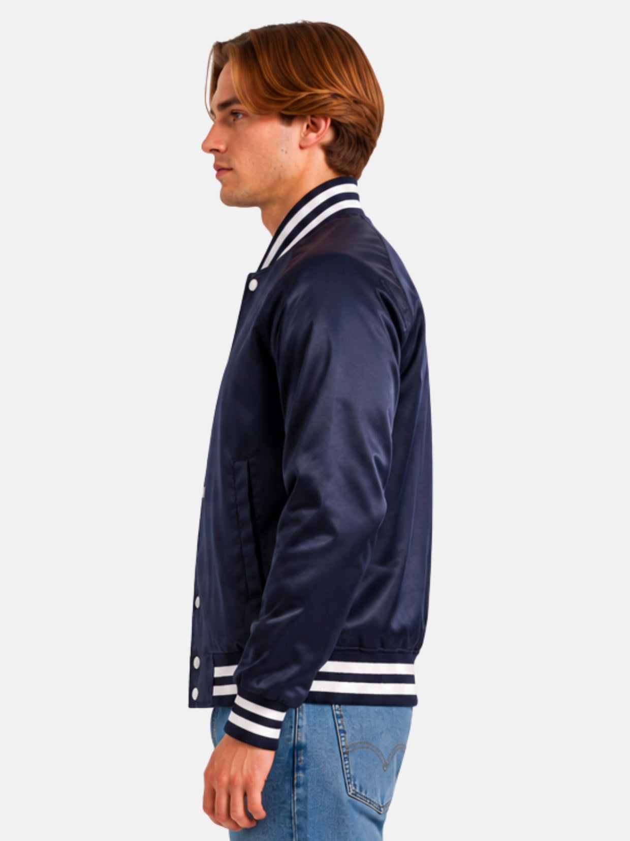 Side profile of tonal navy varsity jacket showing raglan sleeve and striped cuff