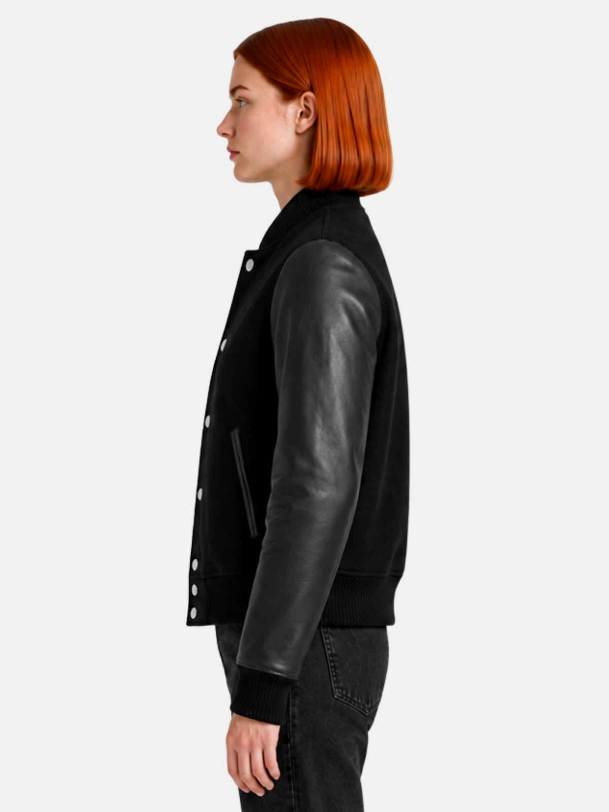 Side profile of womens triple black varsity jacket showing leather sleeve and welt pocket
